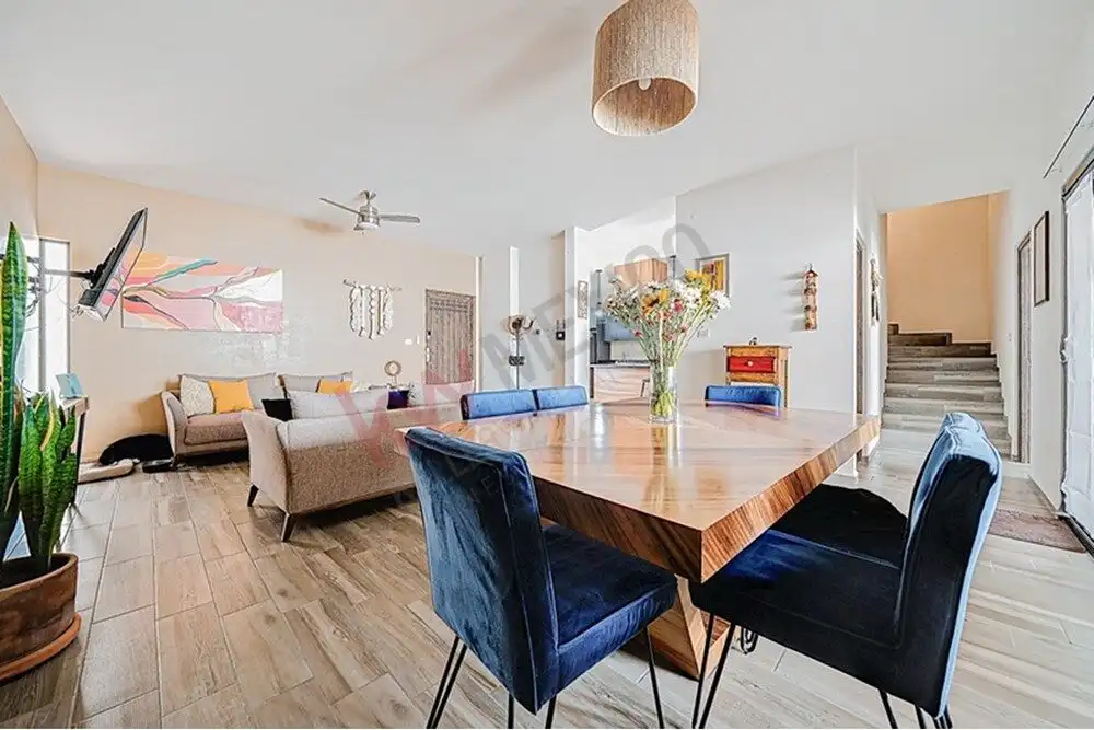 Spacious living and dining area in a modern 4-bedroom home for sale in San Miguel de Allende.