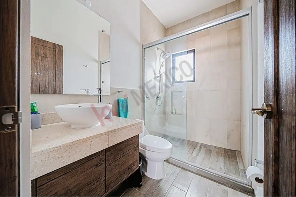 Beautiful bathroom with modern fixtures in a spacious home in San Miguel de Allende.
