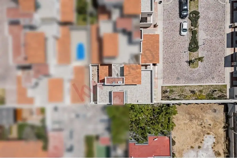 Aerial view of a modern 4-bedroom home with a private pool in San Miguel de Allende.