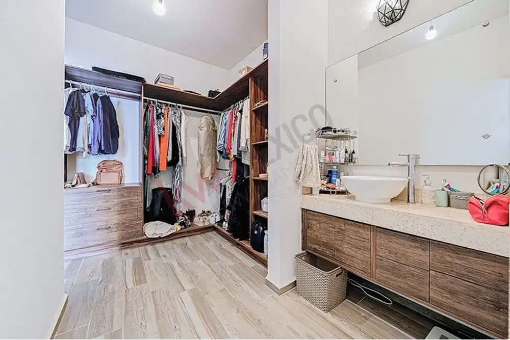 In closet and modern bathroom in a beautiful San Miguel de Allende home.