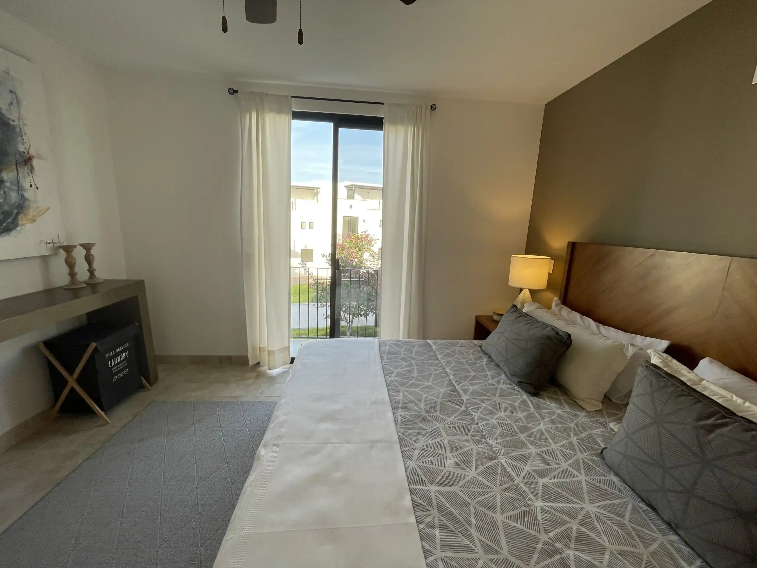 Luxury Home with Pool in La Luminaria Elegant bedroom with heated pool view in San Miguel de Allende.