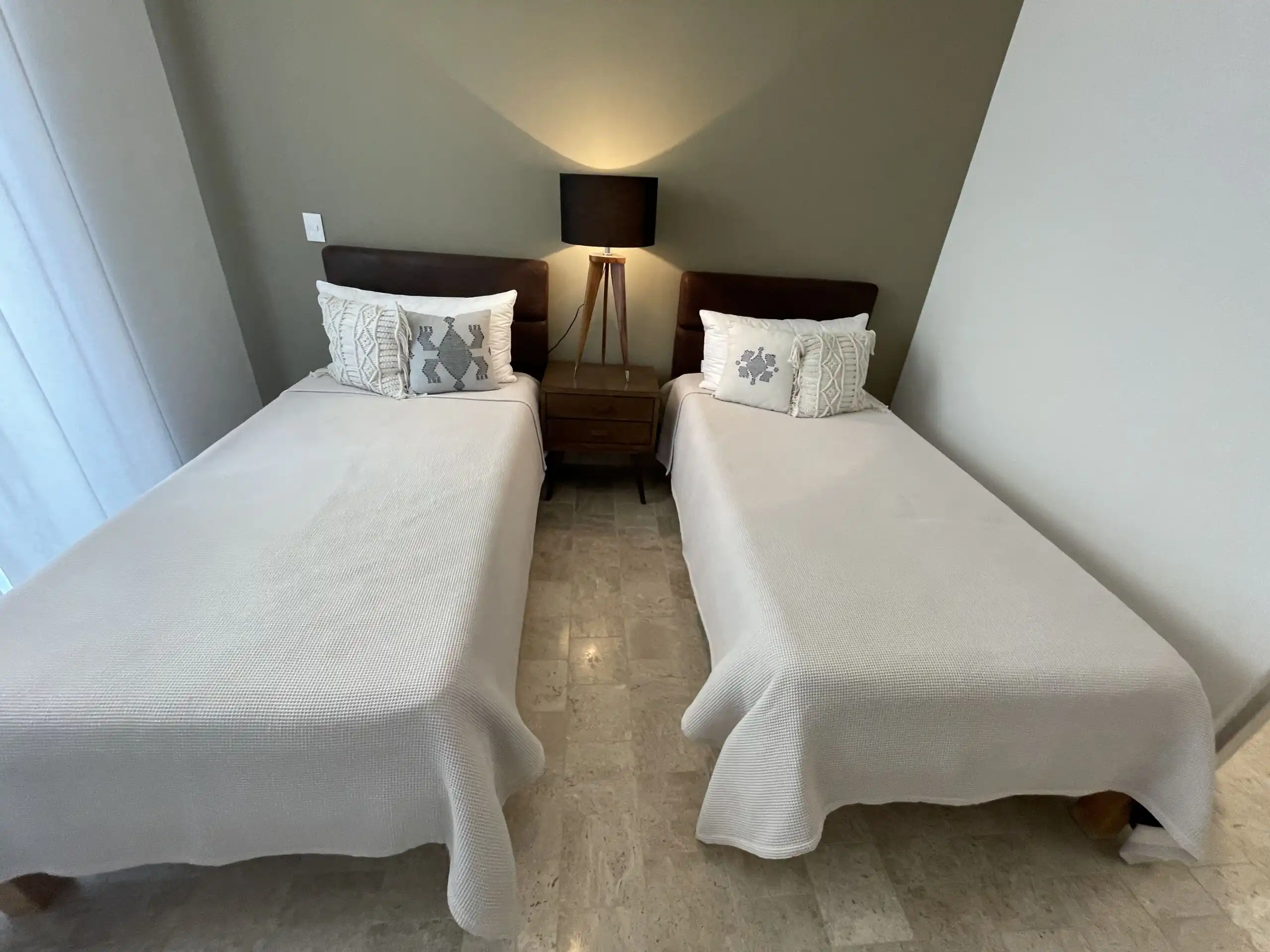 Luxury Home with Twin Beds in San Miguel de Allende Luxury twin bedroom with modern decor in Casa Santa Mónica, San Miguel de Allende.