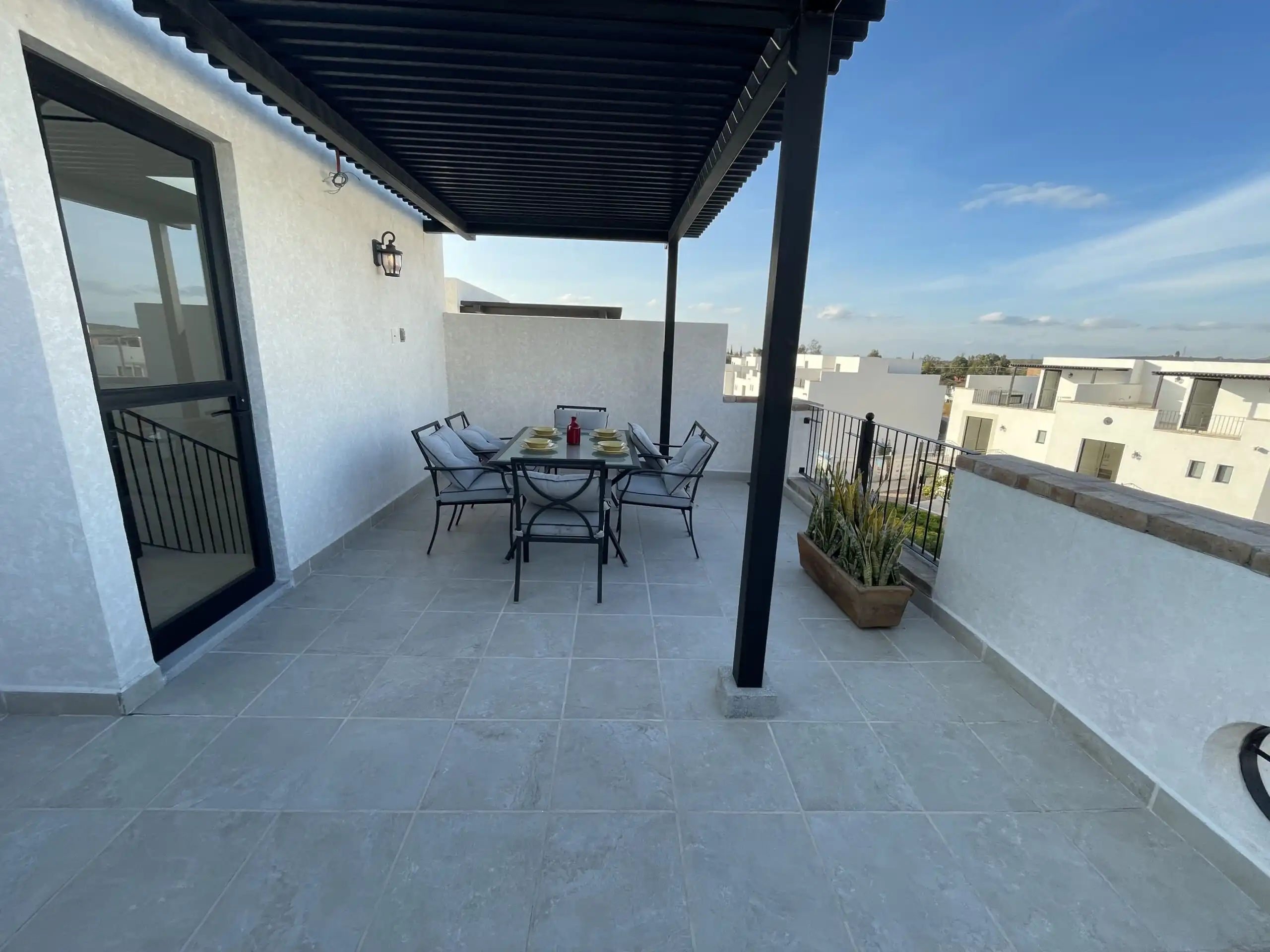 Luxury Terrace with City Views in San Miguel de Allende Balcony with outdoor dining area and panoramic city views in a luxury home in La Luminaria.