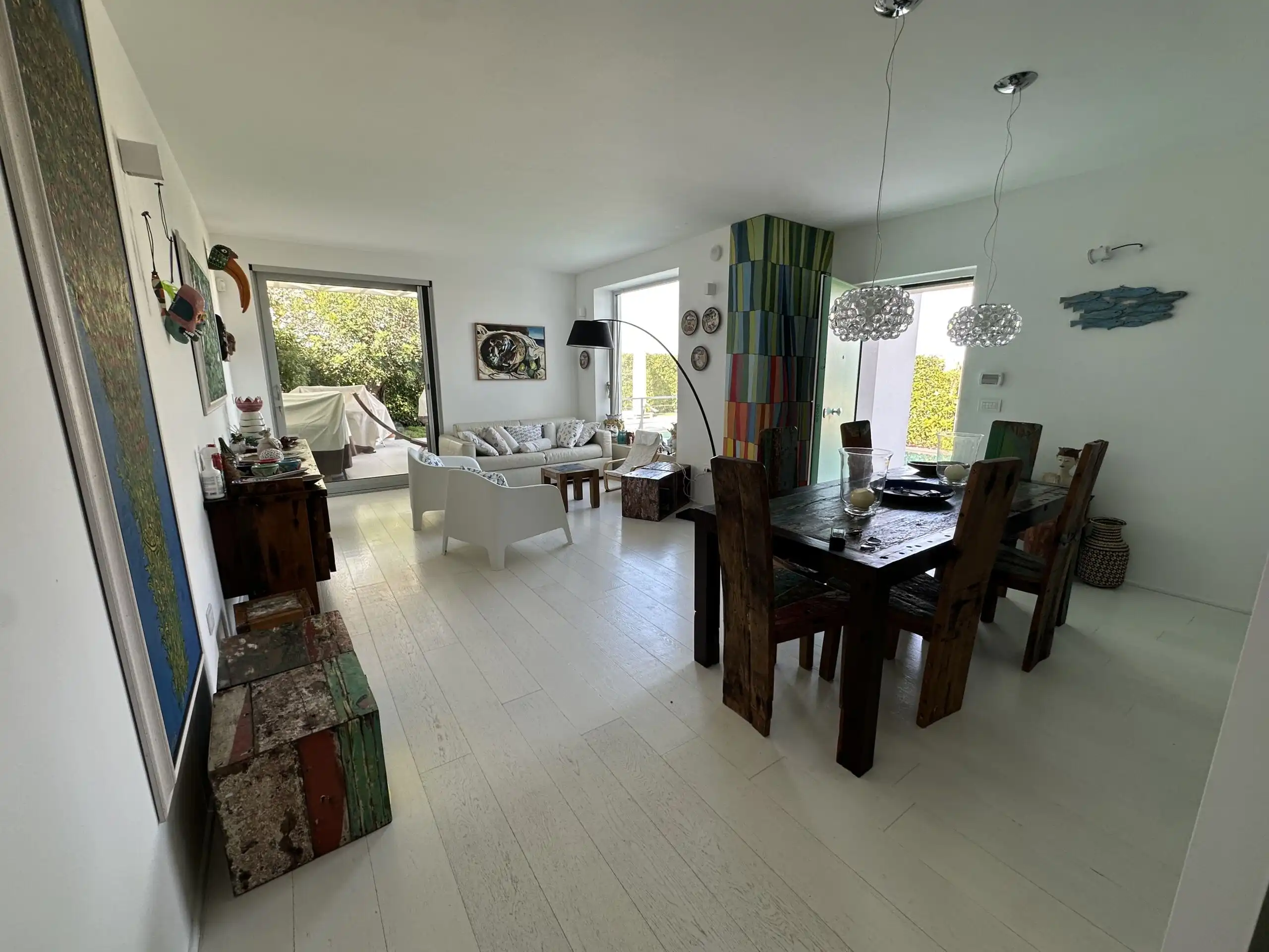 Spacious living and dining area of a luxury villa in Otranto, Puglia, near the Adriatic Sea.
