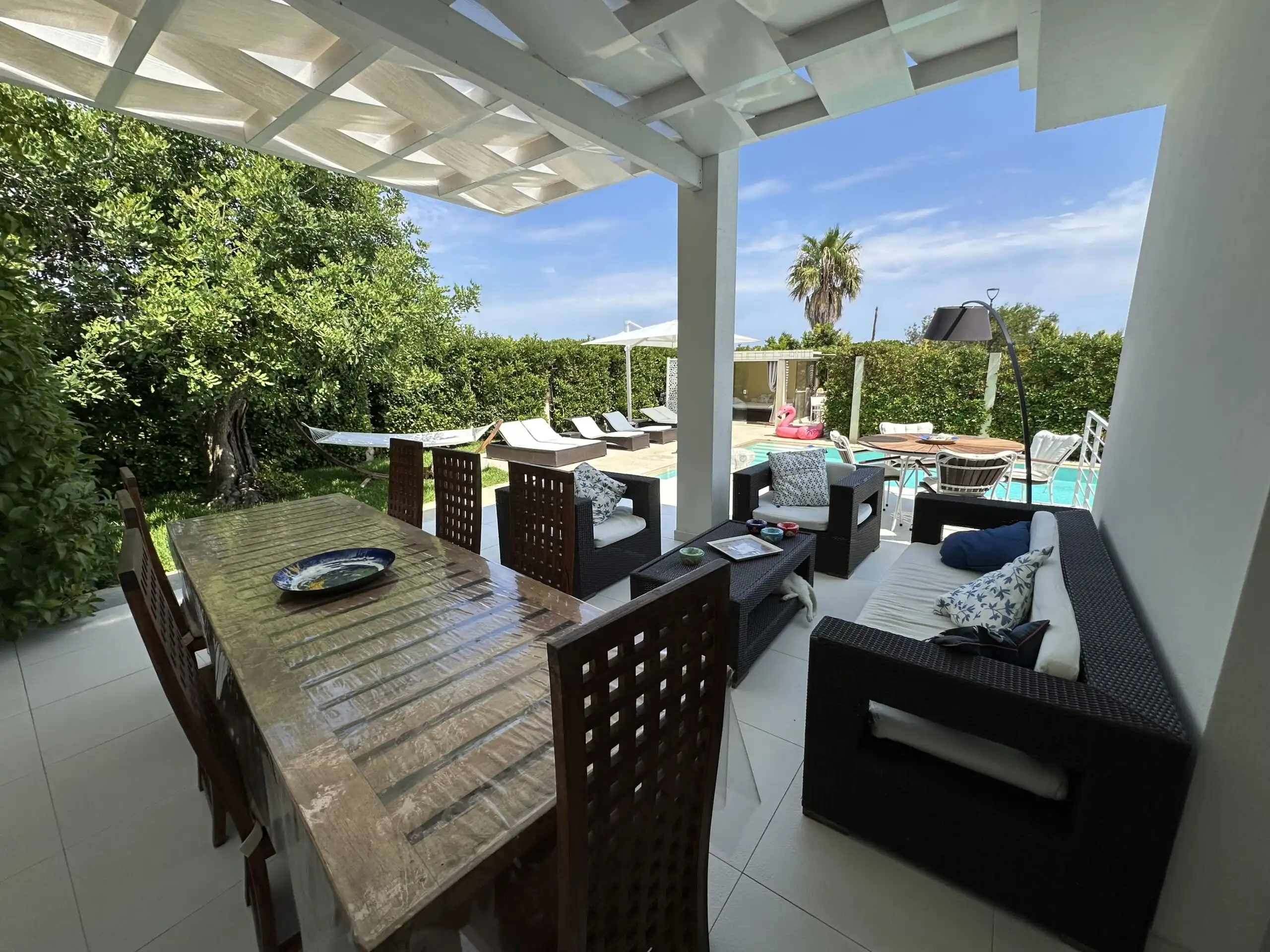 Luxury panoramic villa terrace with outdoor seating in Otranto, Puglia, near the Adriatic Sea.
