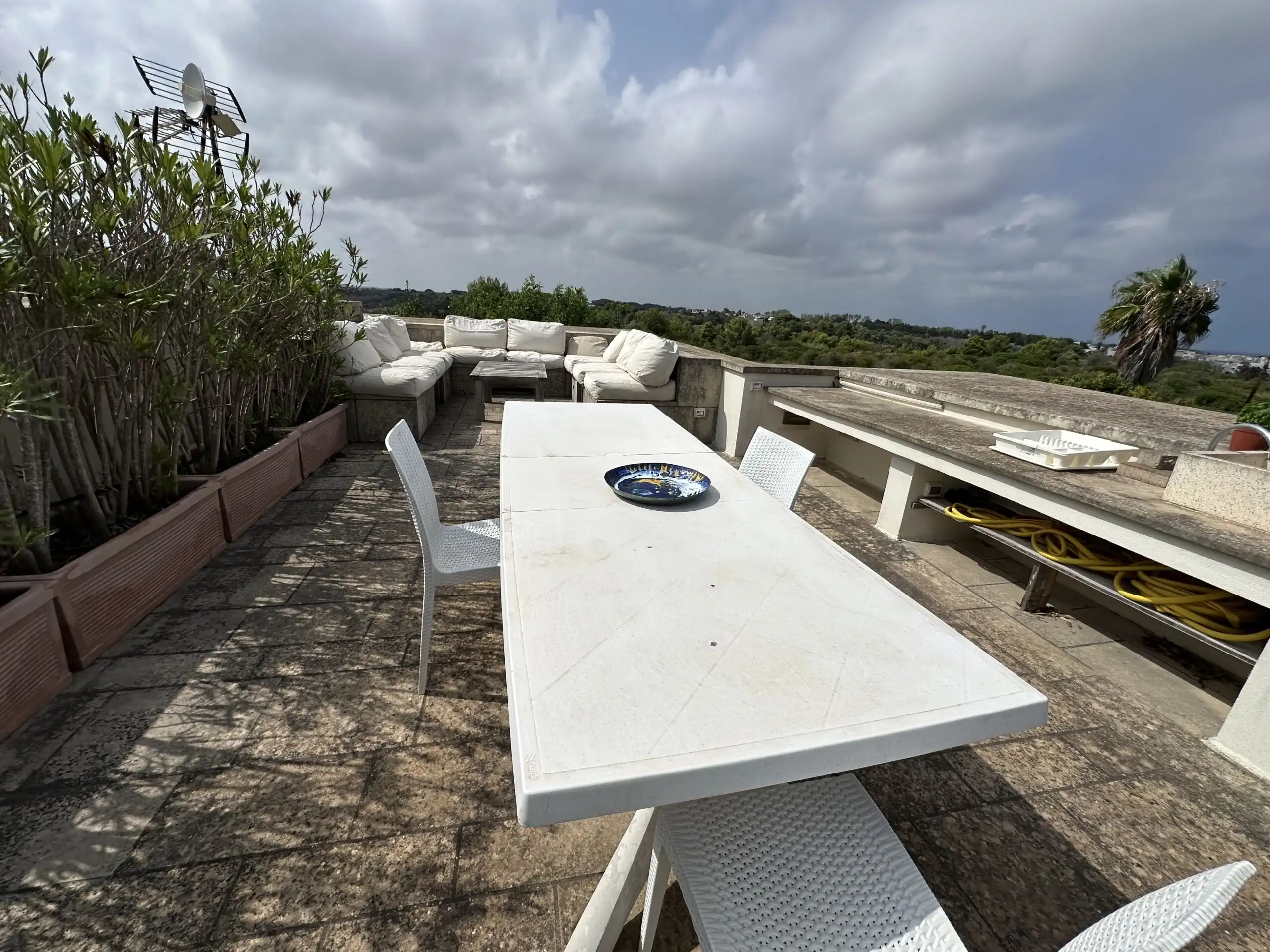 Outdoor terrace of luxury villa overlooking the Adriatic Sea in Otranto, Puglia.