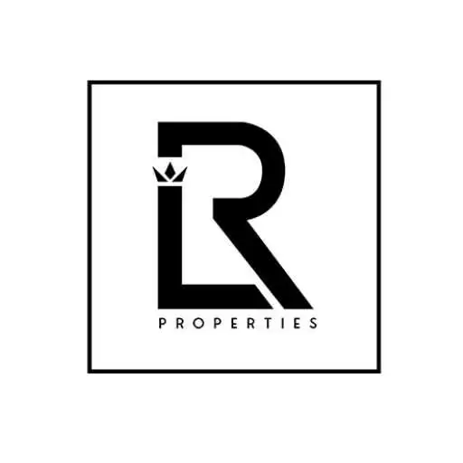 Luxury real estate logo with a crown and modern design.