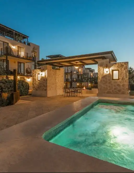 Luxurious modern home with heated pool and outdoor lounge area in La Luminaria.