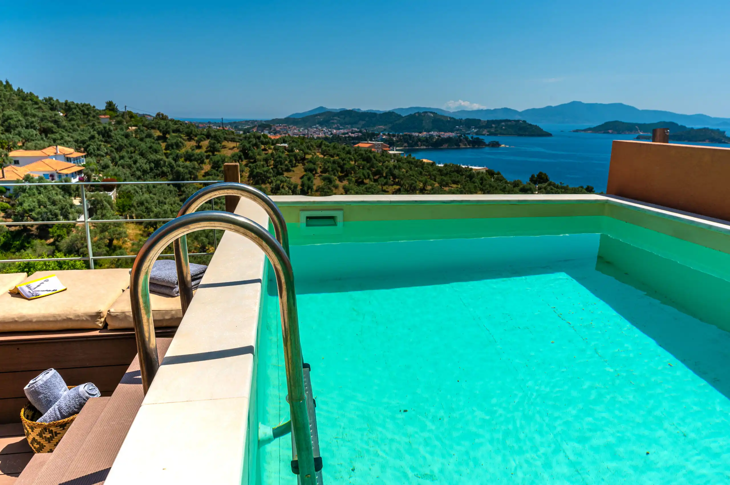 View infinity pool at a luxury villa in Skiathos, Greece.