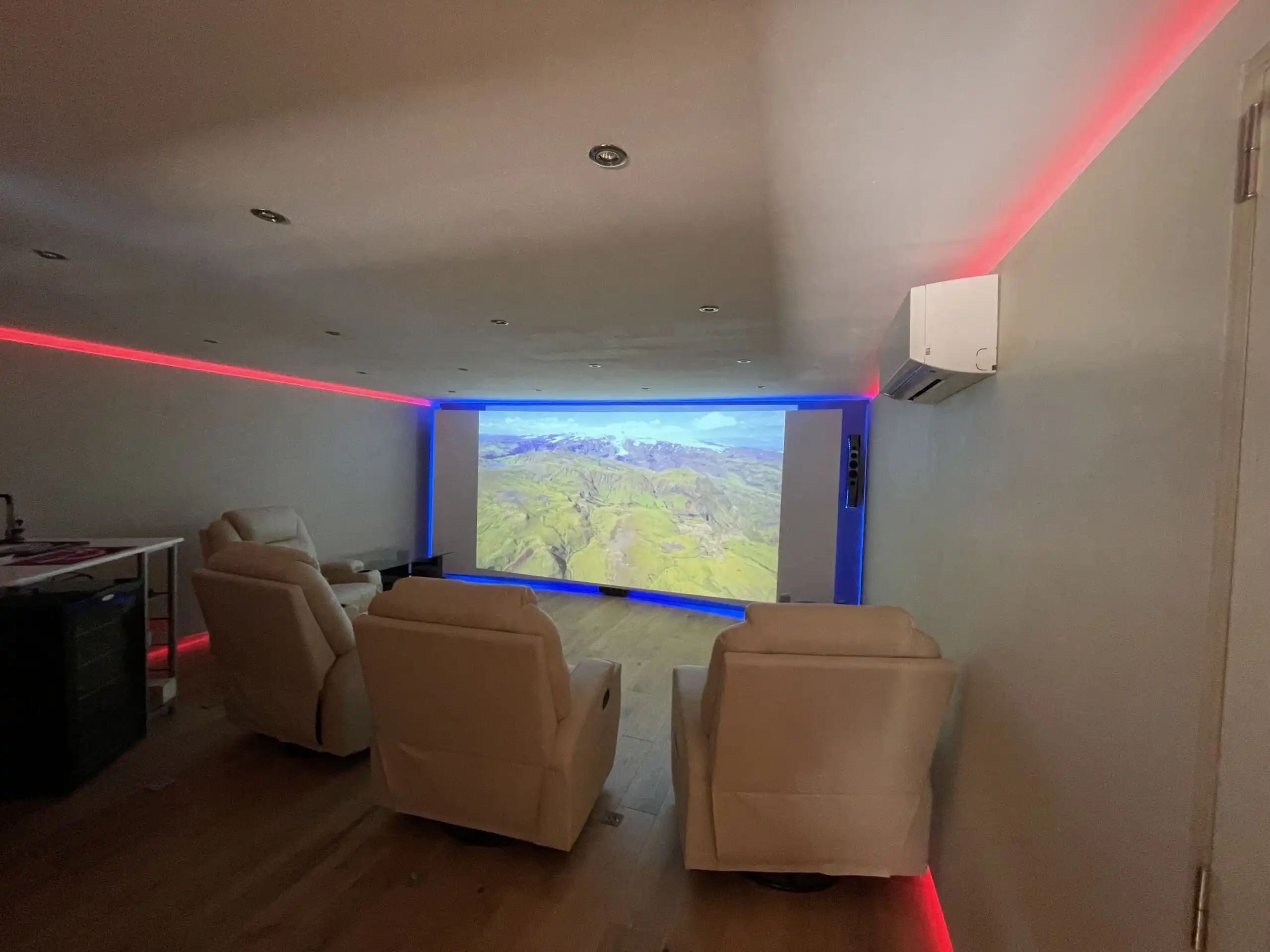 Elegant home theater with large screen and comfortable seating in Biot.