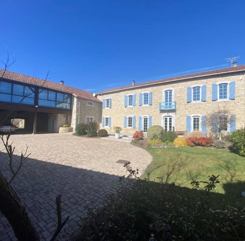 Built bed and breakfast for sale in Ausson, Haute Garonne, with beautiful gardens and modern ameniti.
