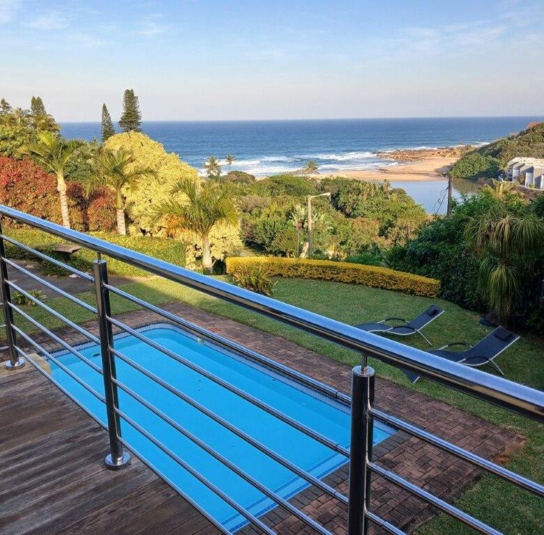 Stunning ocean view from a luxury 5-bedroom villa in Ramsgate South. Perfect for seaside living and.