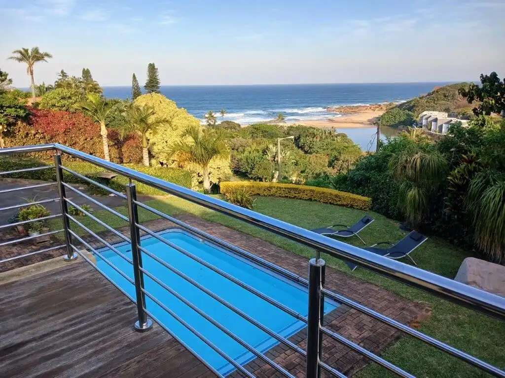 Stunning ocean view from a luxury 5-bedroom villa in Ramsgate South. Perfect for seaside living and.