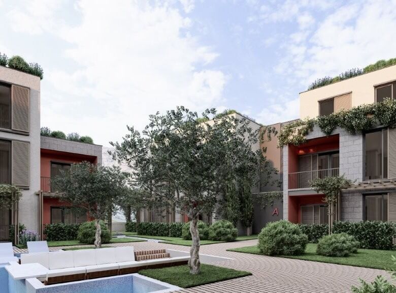 Bright and spacious apartments at Palm City Residencies, Kotor, with lush greenery and contemporary.
