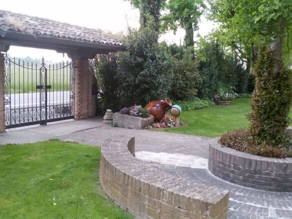 Beautiful estate with lush gardens and elegant landscaping in Forli.