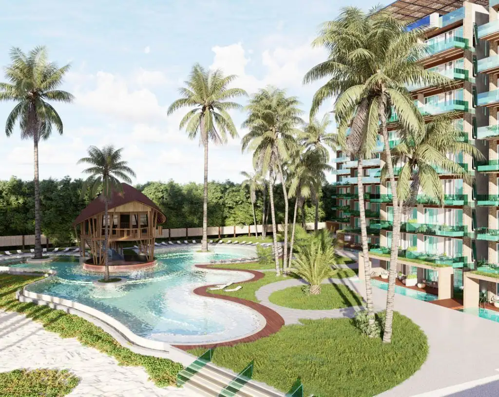 Luxury Sisal Beach Resort with pool and palm trees.