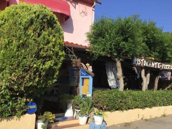 Restaurant and apartment for sale in Marciana, Elba Island, Tuscany, with scenic outdoor seating and.