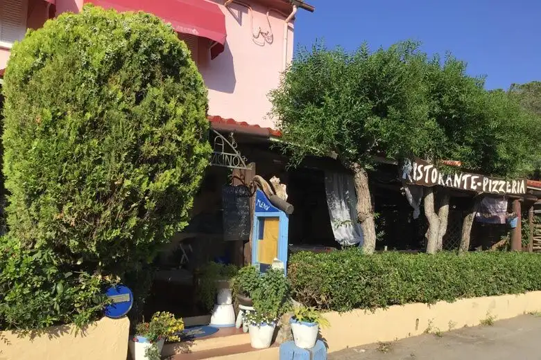 Restaurant and apartment for sale in Marciana, Elba Island, Tuscany, with scenic outdoor seating and.