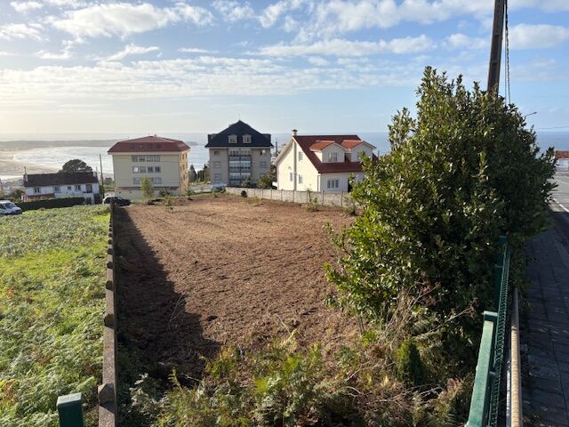 Land for sale in Valdovino, La Coruna with ocean views and development potential.