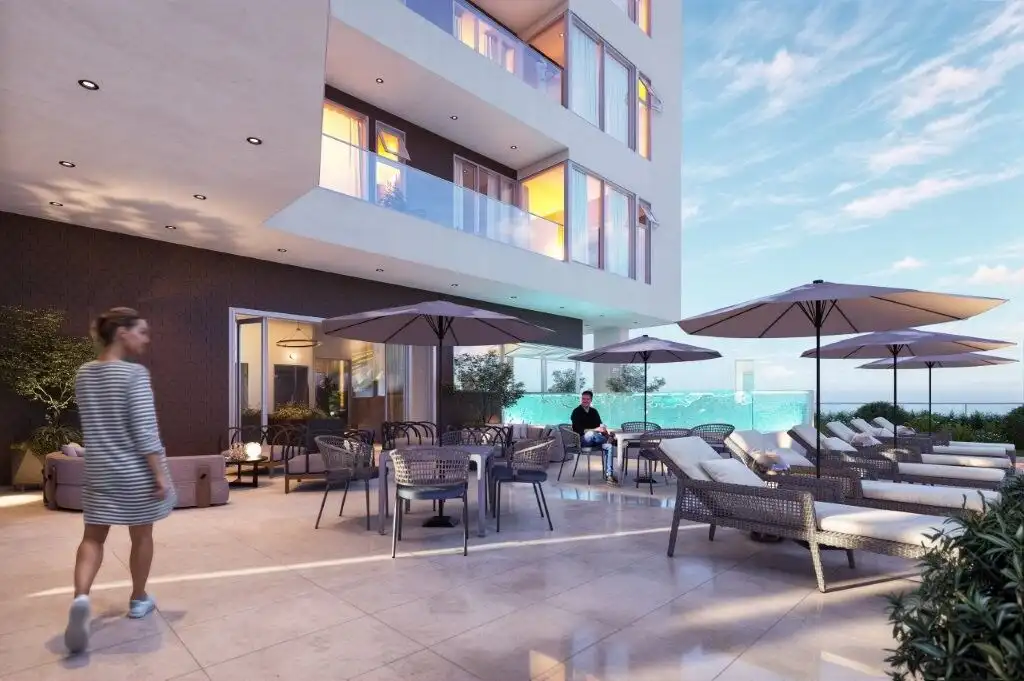 Luxury condos for sale in Tijuana featuring modern design, pool, and outdoor terrace. Perfect for co.