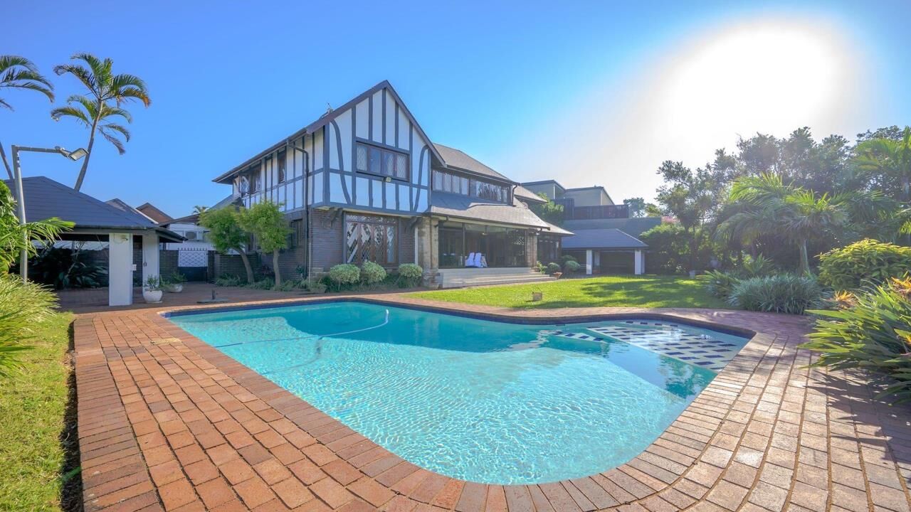 Luxury Durban Estate with Pool and Garden Elegant 9-bedroom estate in Durban featuring a private pool and lush gardens. Perfect for luxury liv.