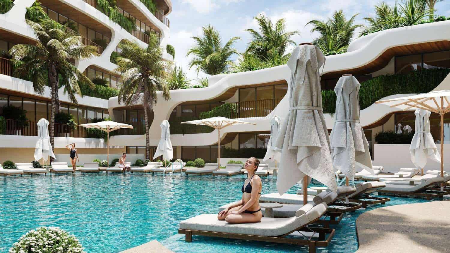 Luxury Bali Poolside Relaxation Beautiful pool area at Pandawa Dream Complex Bali with sun loungers and umbrellas. Perfect for relax.