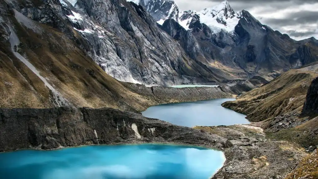Scenic land plot in Peruvian Switzerland with mountain views and lake nearby.