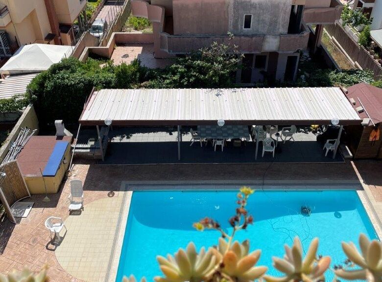 Bright 2-bedroom apartment with swimming pool in Anzio, Italy.