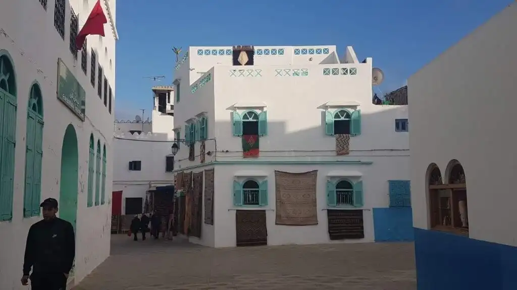 Beautiful white apartment for sale in Asilah South Tanger, featuring traditional architecture and vi.