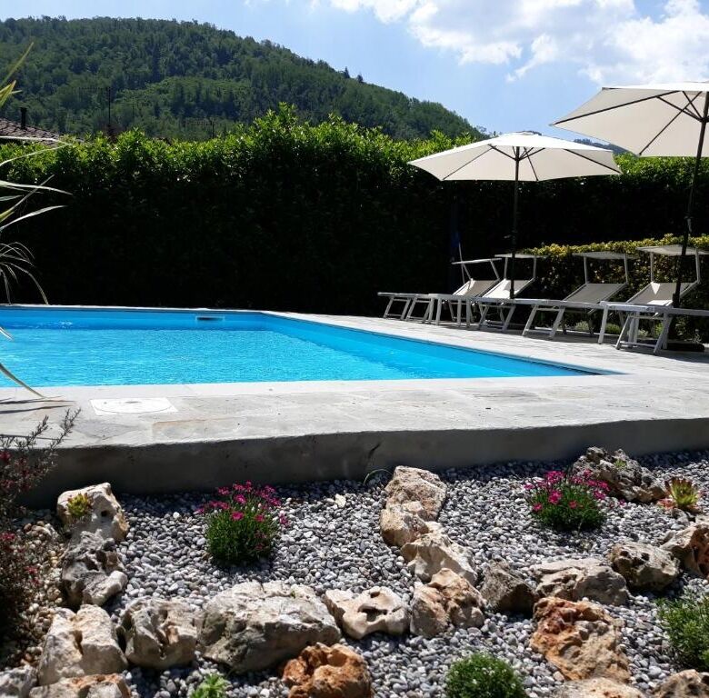 Elegant private pool with mountain views in Bagni di Lucca. Perfect for relaxing holidays in a sceni.