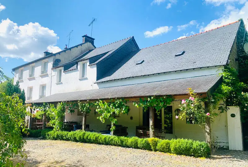 Beautiful 8-bedroom bed and breakfast for sale in Rostrenen, Brittany, offering a perfect lifestyle.