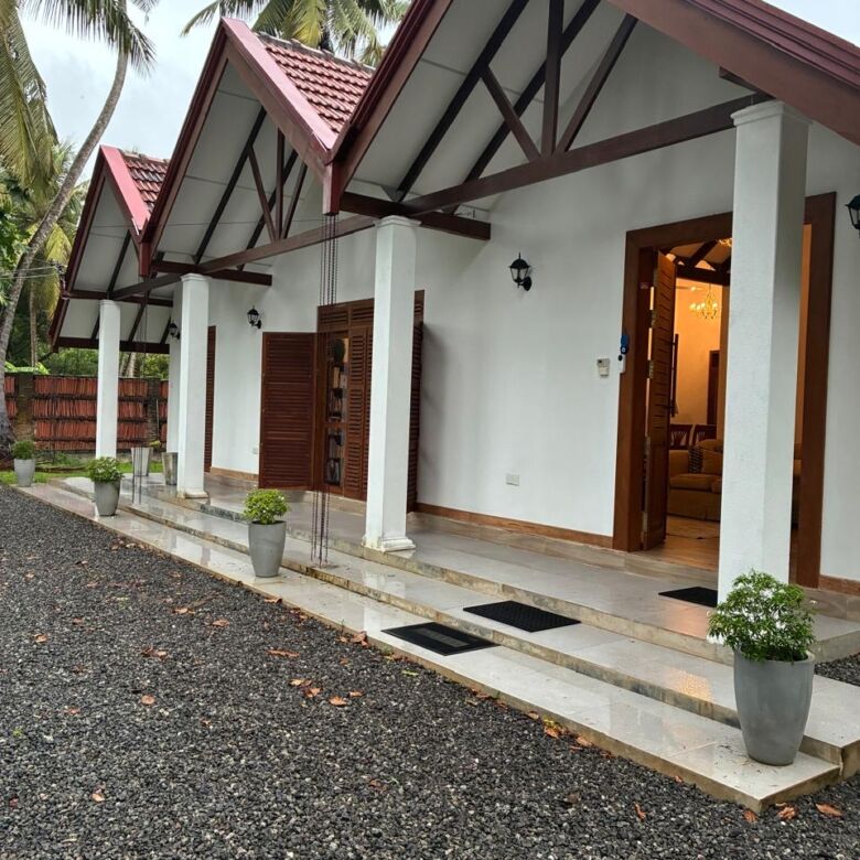 Spacious estate featuring two houses for sale in Waikkal, Sri Lanka, ideal for family living or inve.