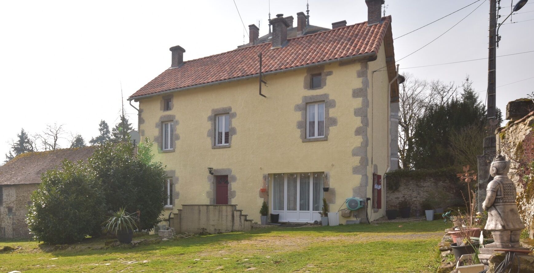 Elegant 4-bedroom house for sale in Dompiere Les Eglises, Haute Vienne, featuring classic architectu.
