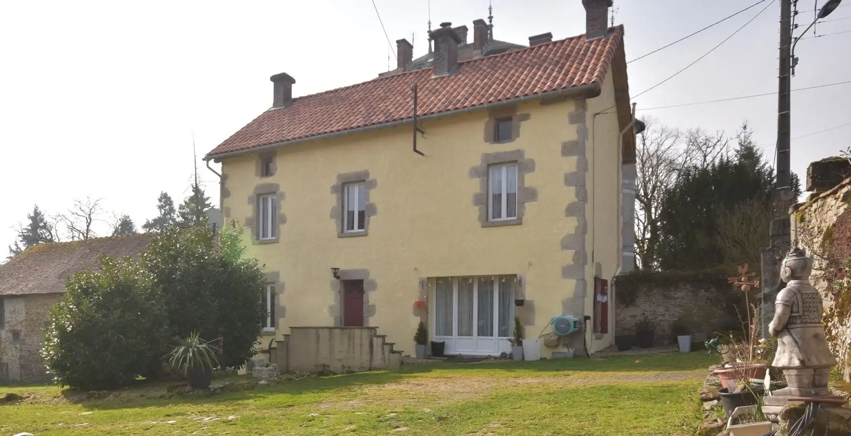 Elegant 4-bedroom house for sale in Dompiere Les Eglises, Haute Vienne, featuring classic architectu.