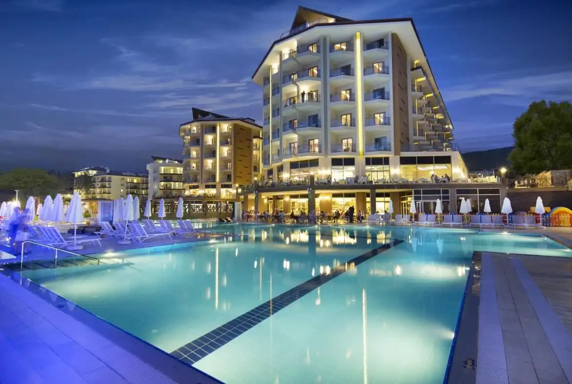 Modern resort suites with stunning pool views in Kusadasi Ramada Resort Aydin.