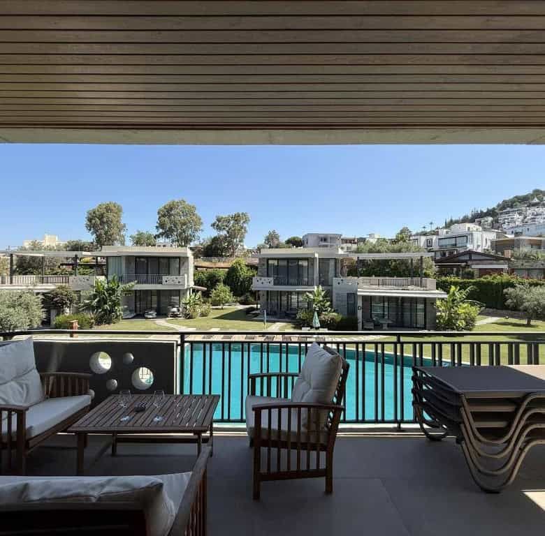 Modern 2-bedroom apartment with pool in Yalıkavak Bodrum, offering stunning views and luxurious amen.