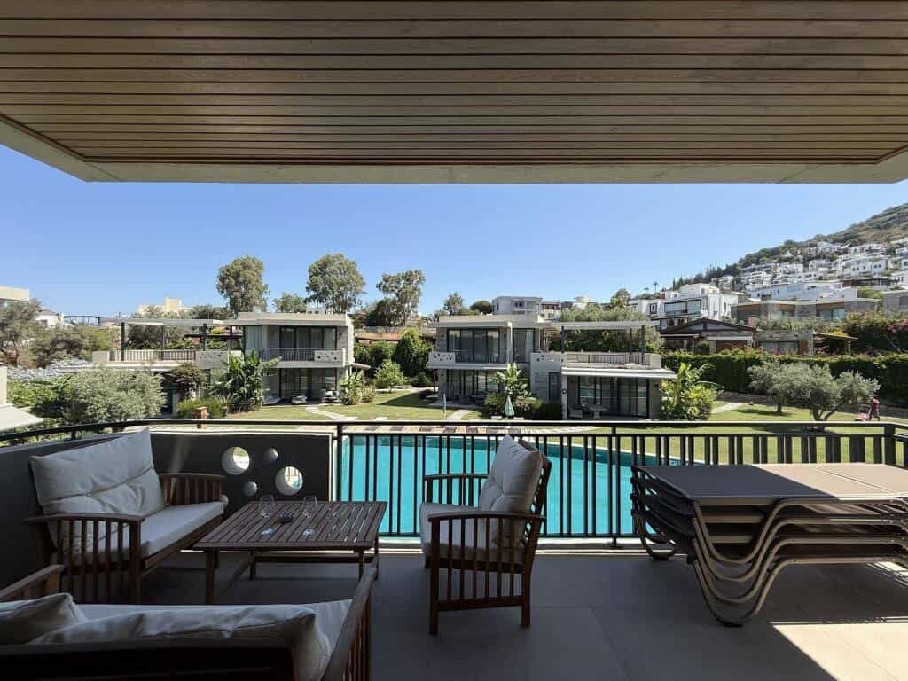 Modern 2-bedroom apartment with pool in Yalıkavak Bodrum, offering stunning views and luxurious amen.