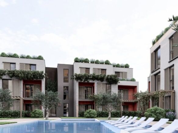 Contemporary apartments at Palm City Residencies in Kotor with lush greenery and scenic views.