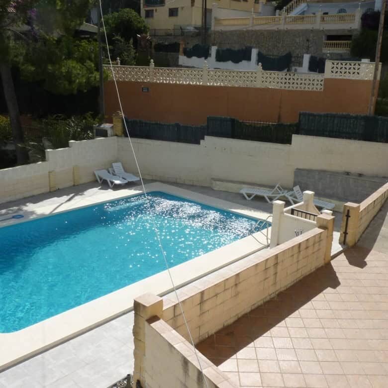 Beautiful private swimming pool at a spacious villa in Valencia. Perfect for relaxing and enjoying s.