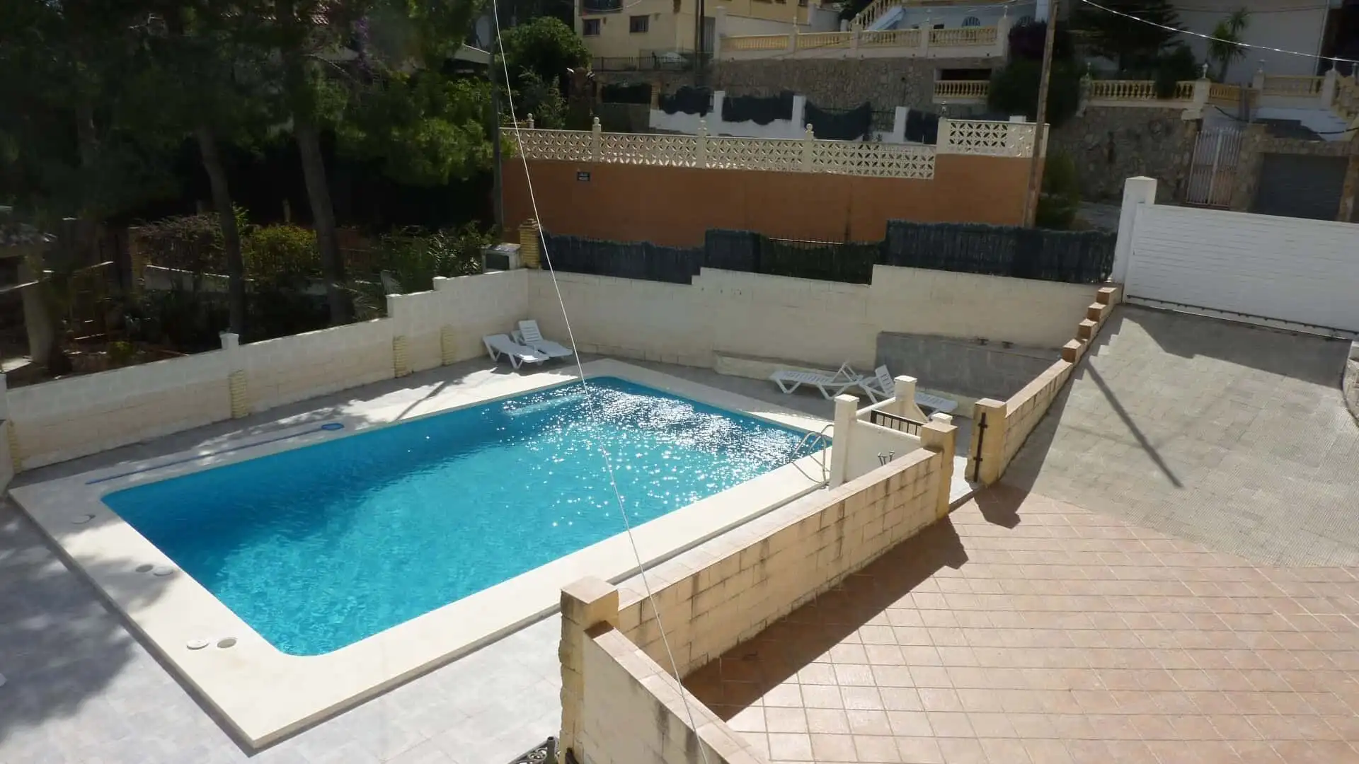 Beautiful private swimming pool at a spacious villa in Valencia. Perfect for relaxing and enjoying s.