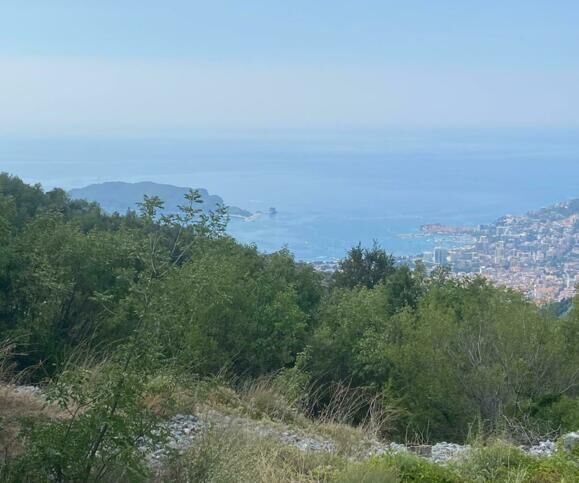 Beautiful land for sale in Budva, Montenegro, offering panoramic views of the Adriatic coast and lus.