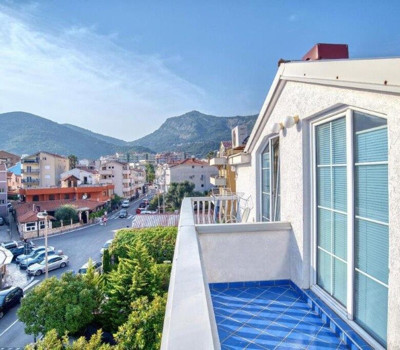 Boutique hotel for sale in Budva with scenic mountain views and modern amenities. Prime investment o.