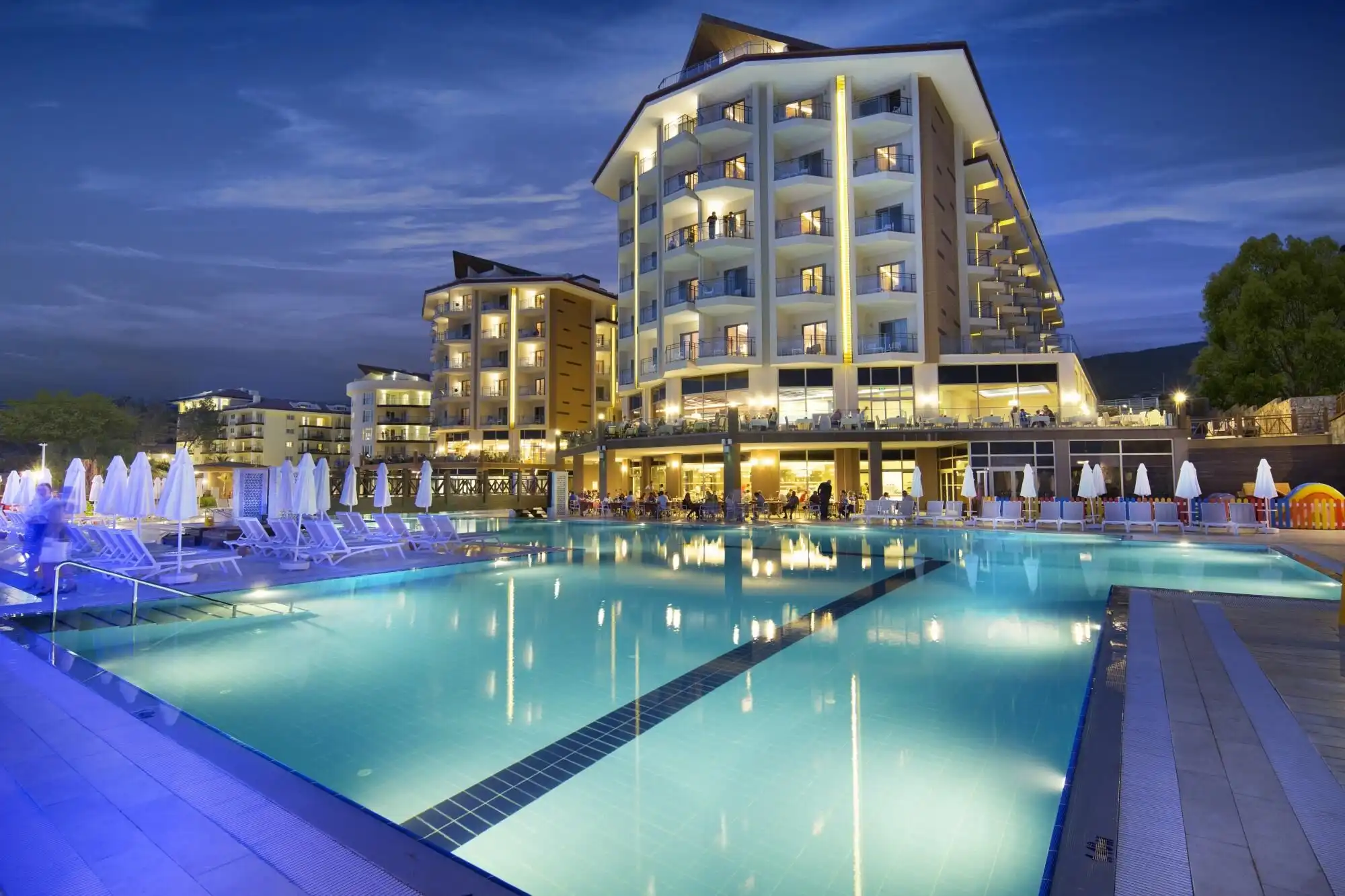 Elegant hotel suite with modern amenities in Ramada Resort Kusadasi. Perfect for luxury living or in.