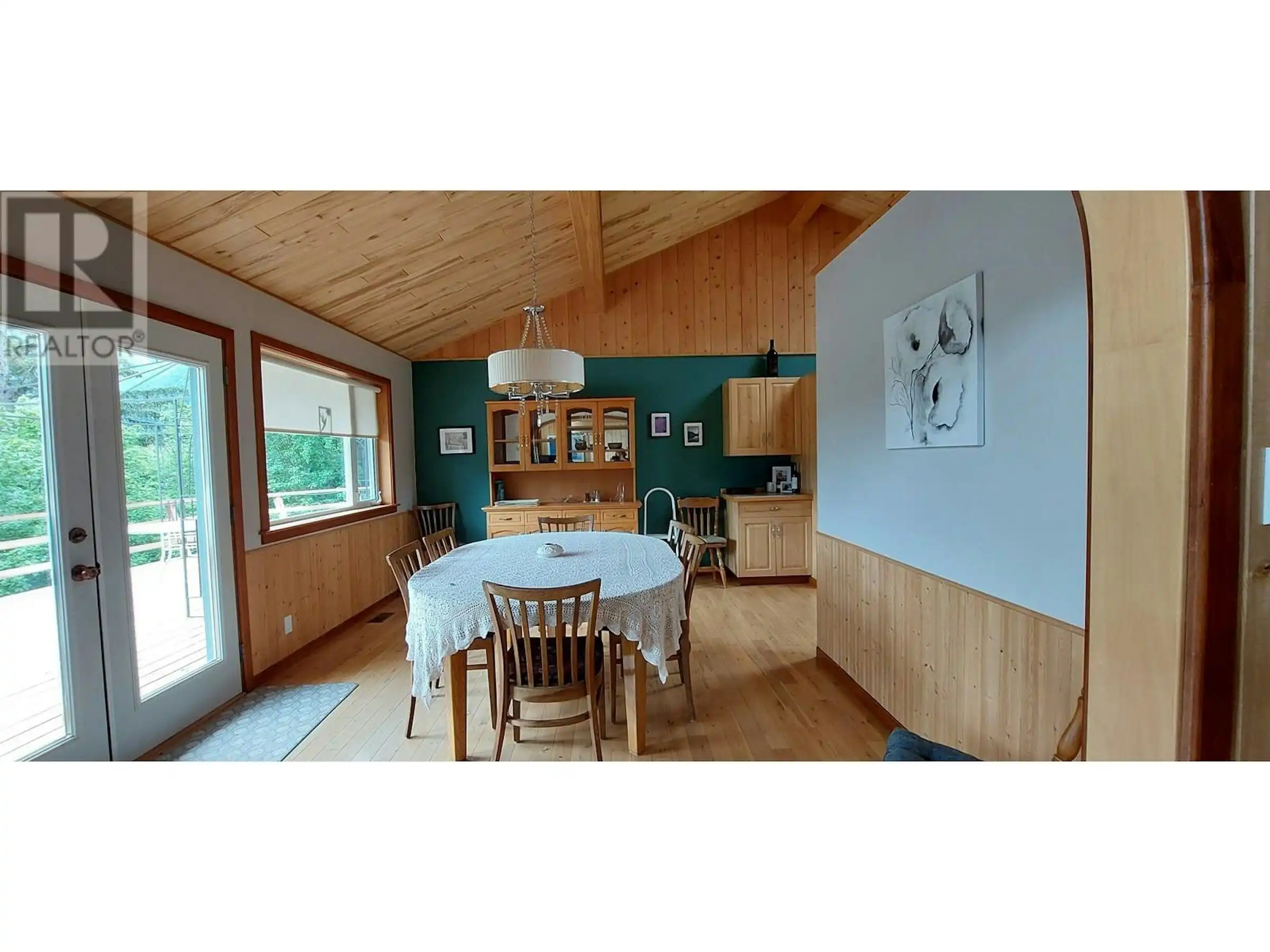 Interior view of a building with 4 apartments in Wilhelmsburg, showing a simple living room.