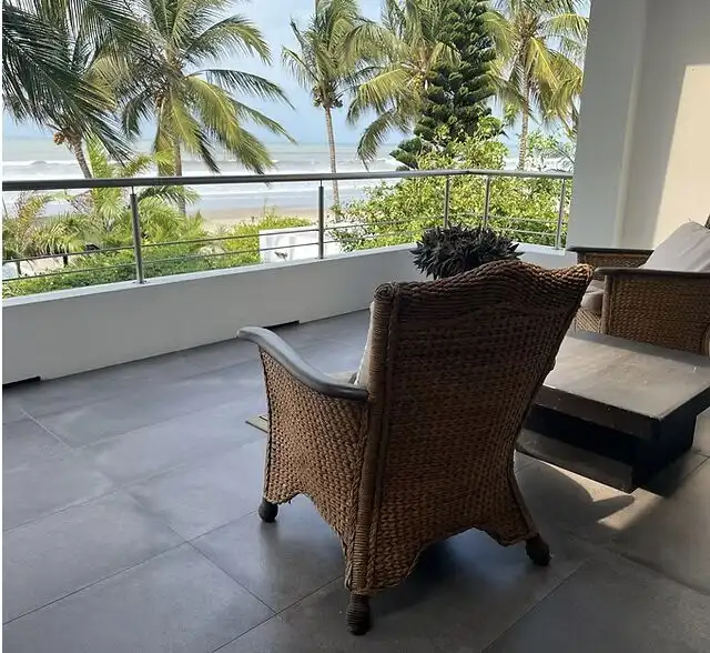 Beachfront villa with ocean views and tropical surroundings. Perfect for relaxing or investment in E.