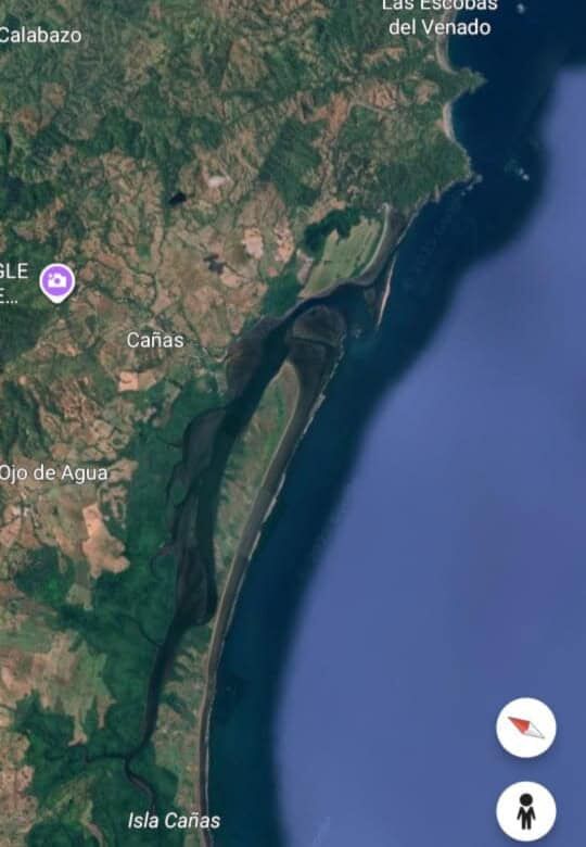Aerial view of riverfront eco-tourism development site near Playa Venao, Panama, showcasing lush lan.