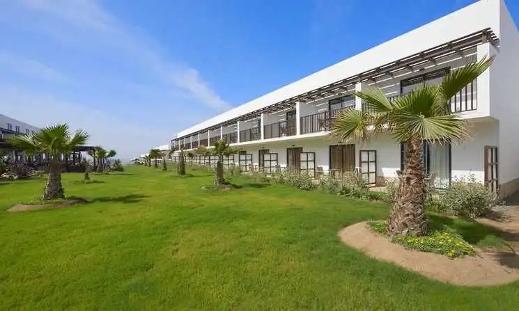 Modern Llana Beach Hotel suite with ocean views in Cape Town for sale.