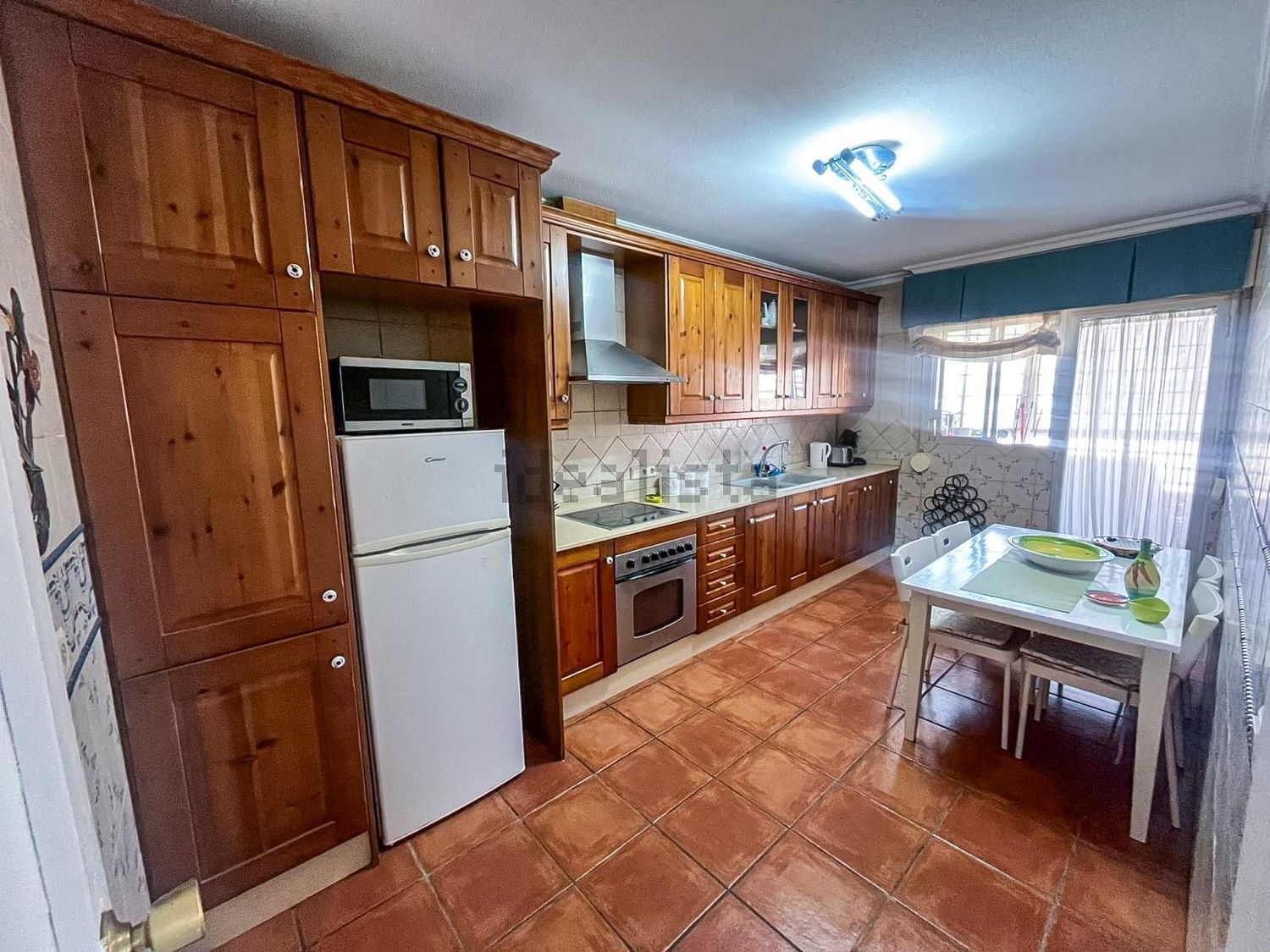 Modern 3-Bed Apartment in Algorfa for Sale Spacious 3-bedroom apartment in Algorfa with wooden kitchen and bright living area.