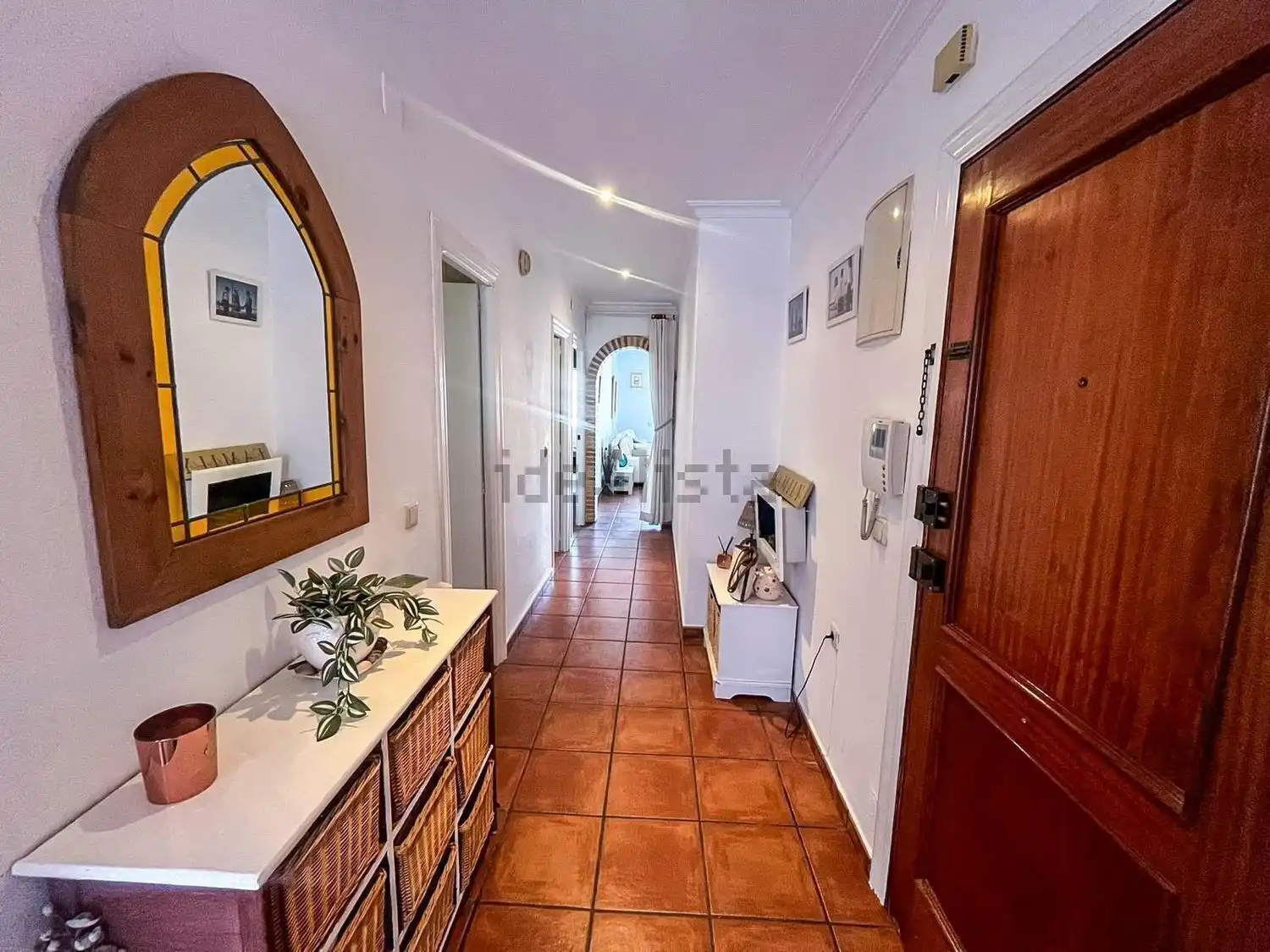 Interior view of a 3-bedroom apartment in Algorfa, Spain, showcasing a bright hallway with wooden ac.