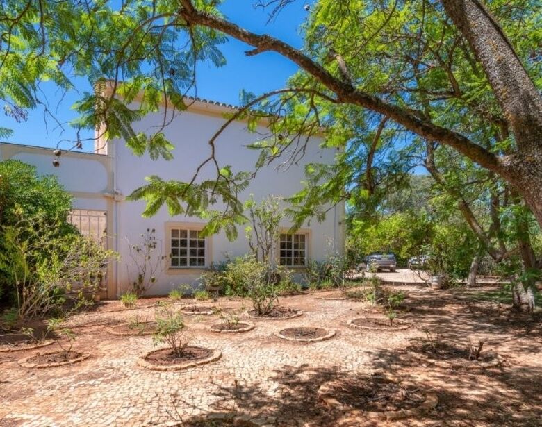Elegant country estate with lush trees and spacious outdoor area in Algoz Algarve.